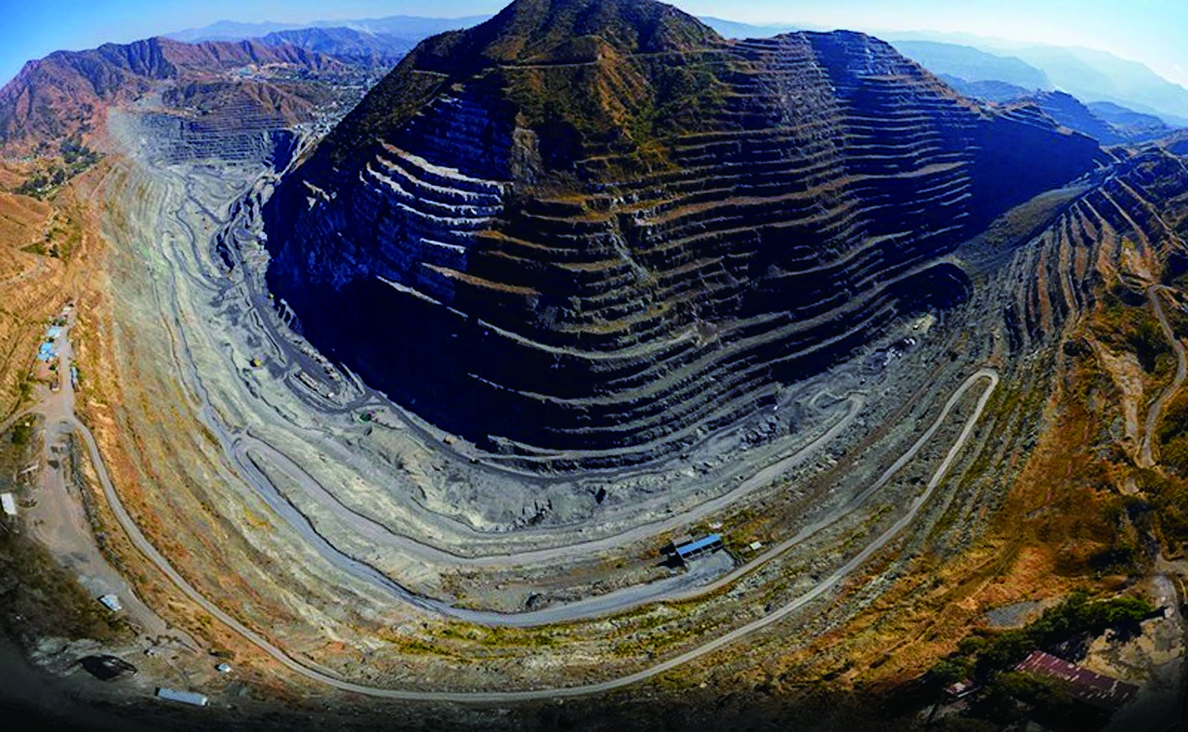Terraced open-pit mine slopes in the Sichuan mine monitoring case study