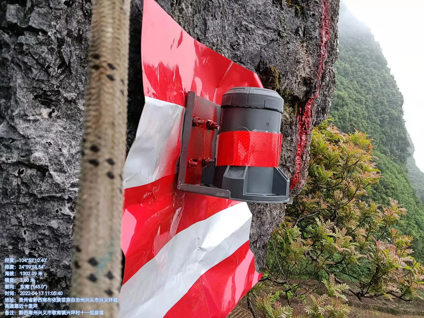 Field installation of a wireless sensor on a rock slope